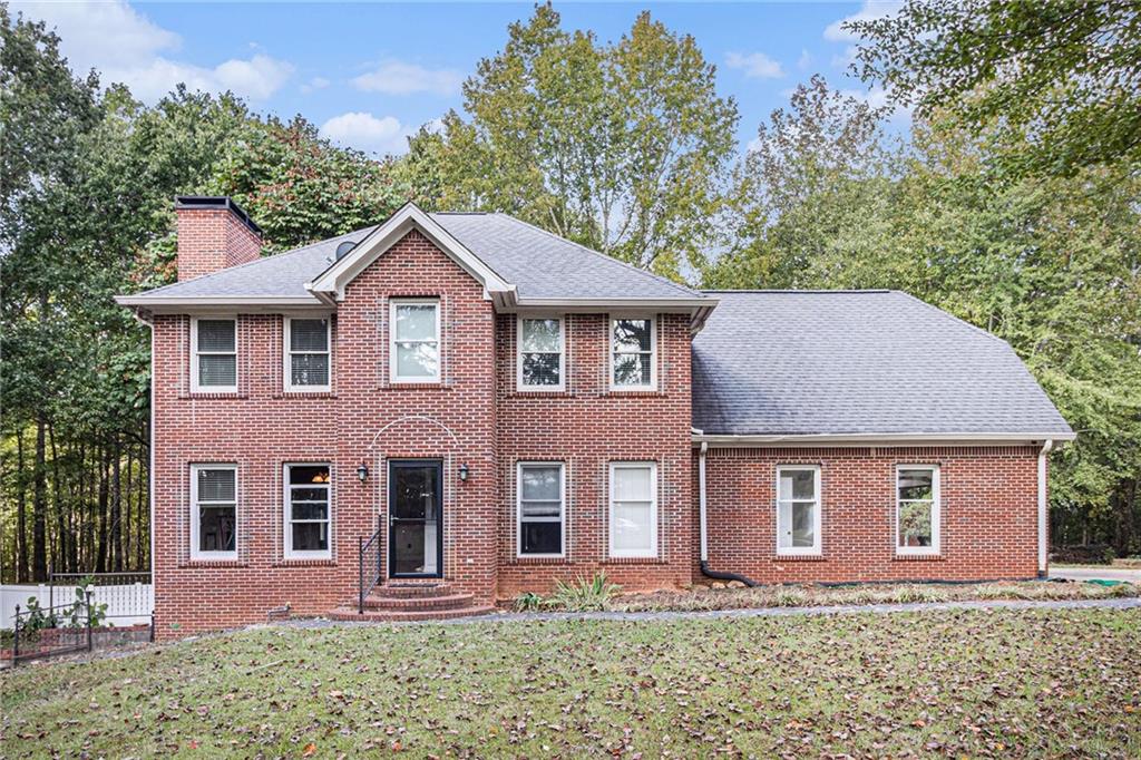 488 McBrayer Road Buchanan, GA 30113 - Photo 1 of 1 a front view of a house with a yard