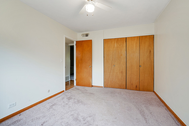 235 East Palatine Road, Unit 1B Palatine, IL 60067 - Photo 9 of 10 an empty room with a empty space and a window