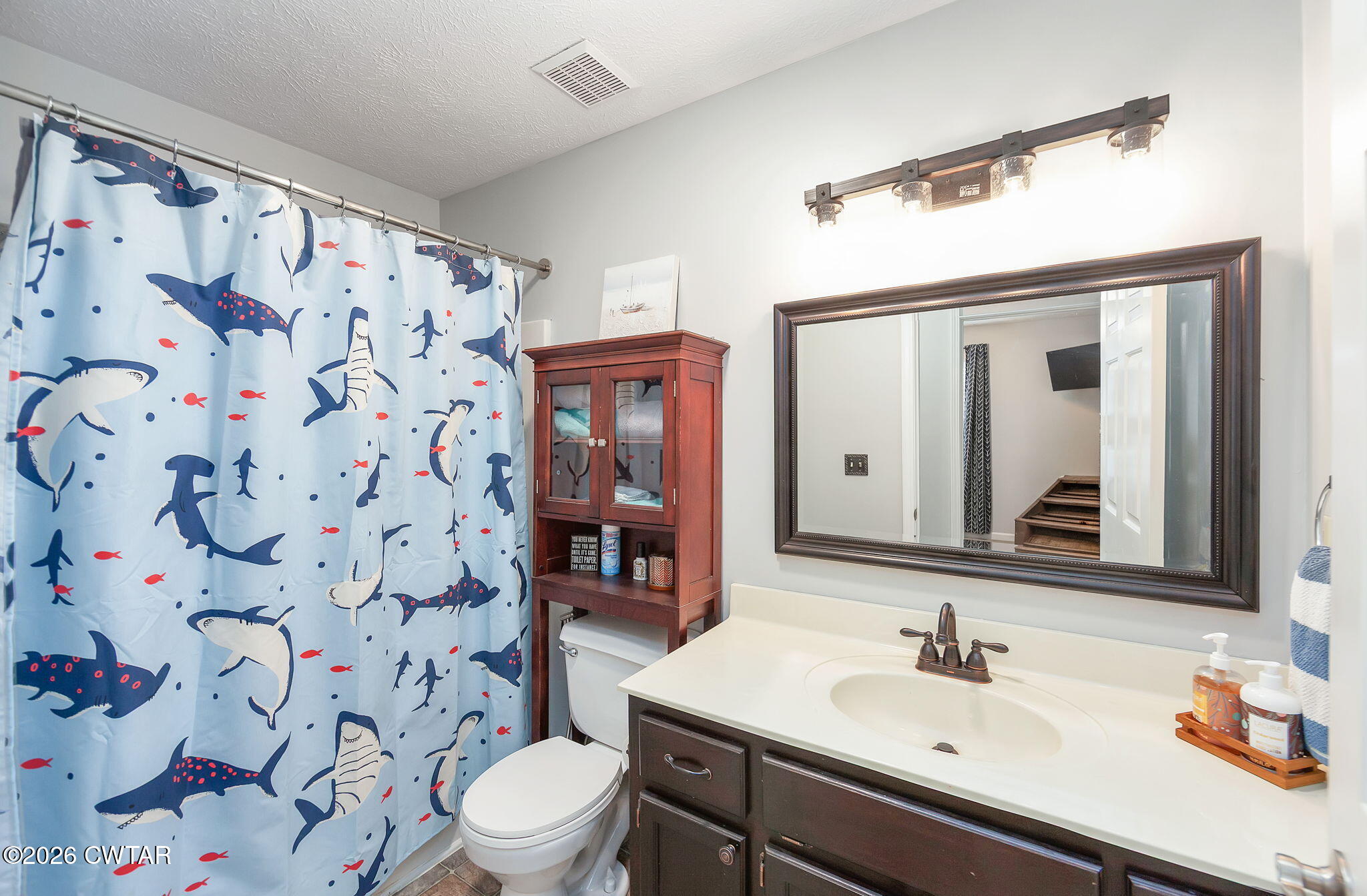 44 Ginger Lane Bells, TN 38006 - Photo 13 of 37 a bathroom with a sink and a mirror