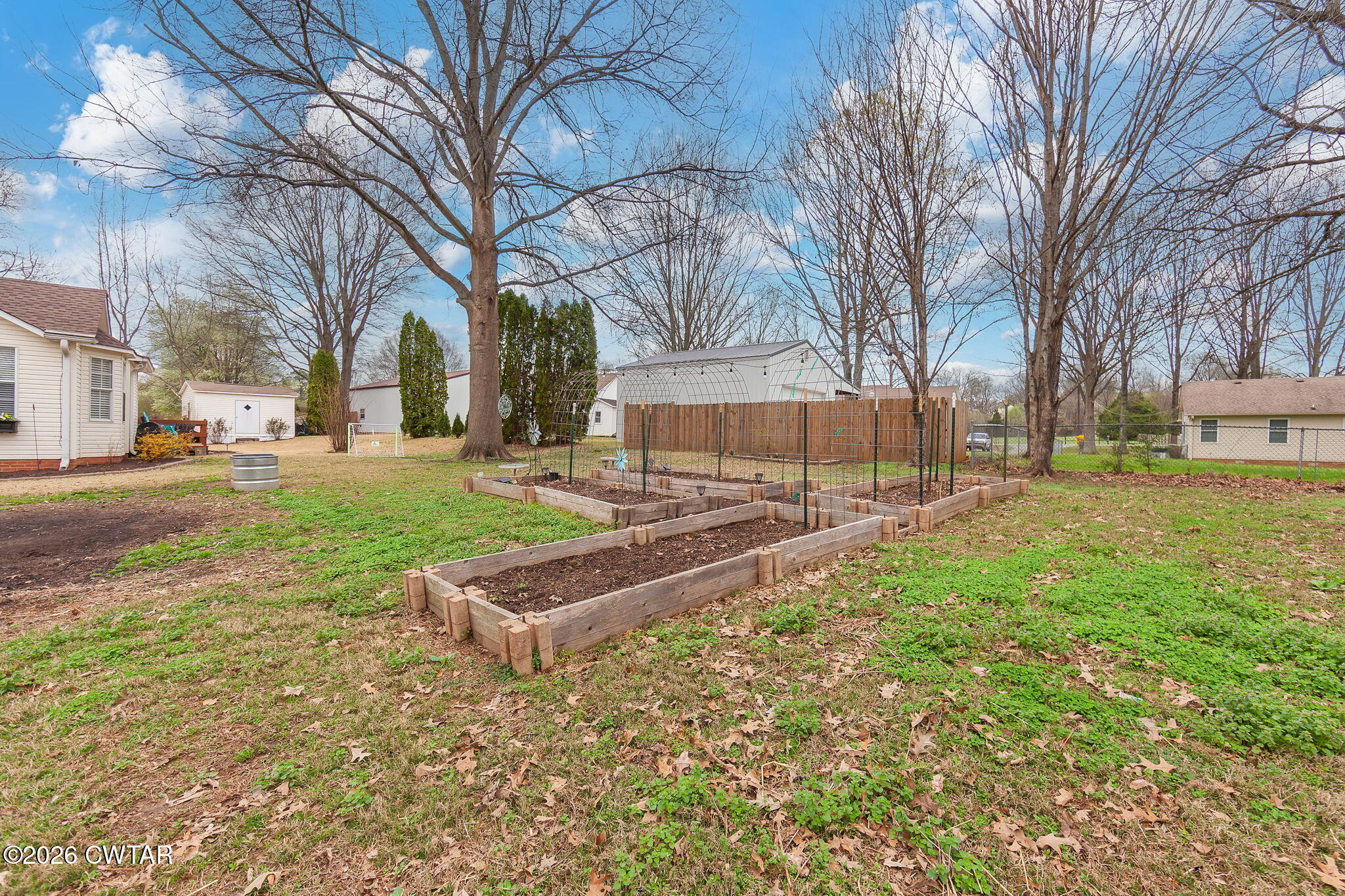 44 Ginger Lane Bells, TN 38006 - Photo 27 of 37 a sign board with yard in front of it