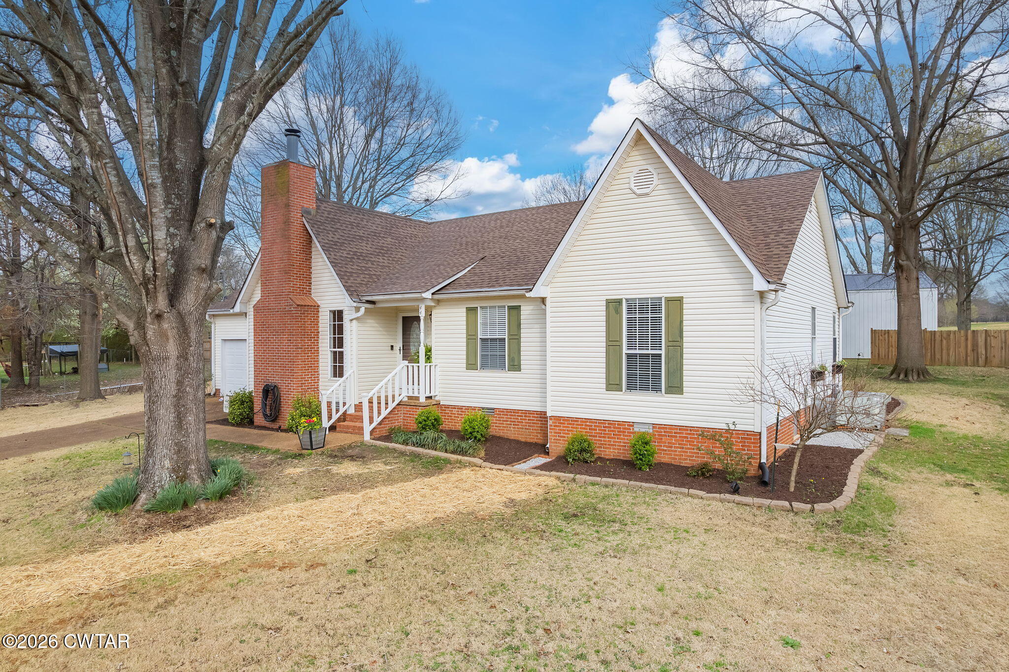 44 Ginger Lane Bells, TN 38006 - Photo 36 of 37 a front view of a house with a yard