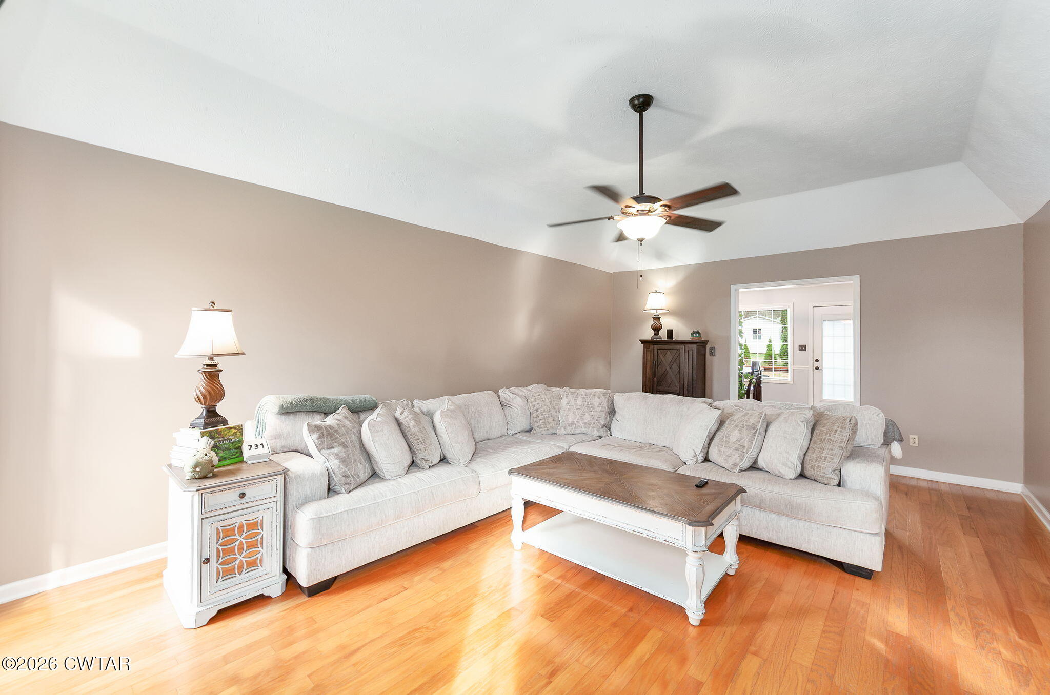 44 Ginger Lane Bells, TN 38006 - Photo 7 of 37 a living room with furniture and a chandelier