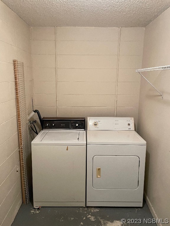 2352 Fern Palm Drive Edgewater, FL 32141 - Photo 12 of 12 a utility room with dryer and washer