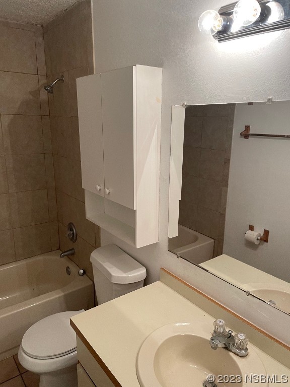 2352 Fern Palm Drive Edgewater, FL 32141 - Photo 9 of 12 a bathroom with a sink a toilet and shower