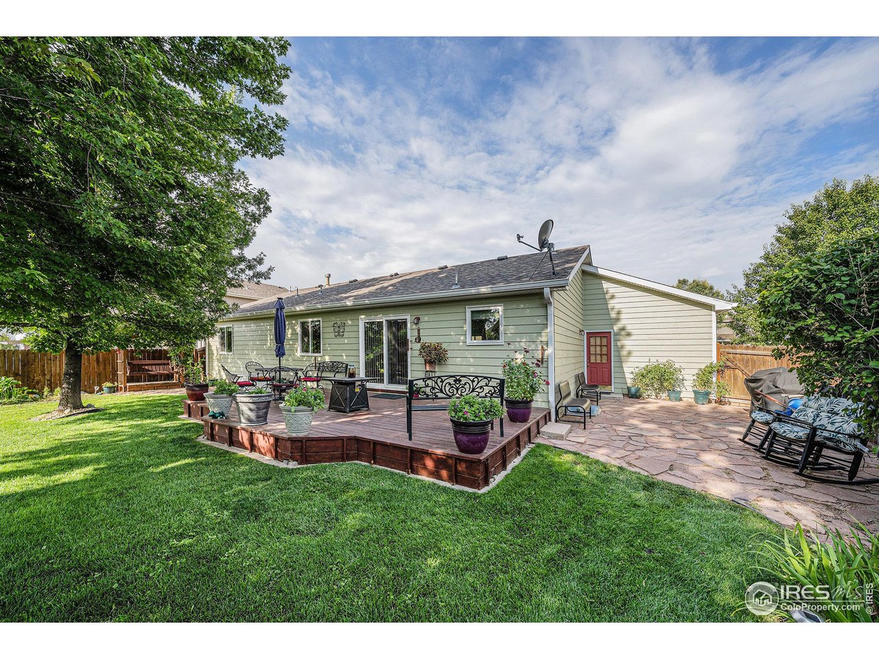 3182 50th Avenue Greeley, CO 80634 - Photo 19 of 21 a view of a house with backyard and sitting area