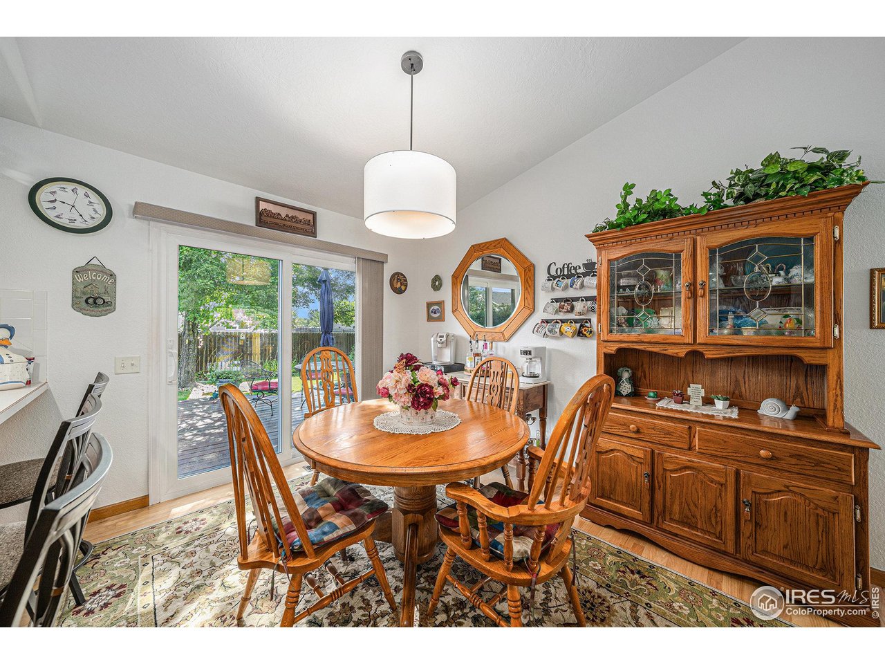 3182 50th Avenue Greeley, CO 80634 - Photo 7 of 21 a view of a dining room and a table and chairs