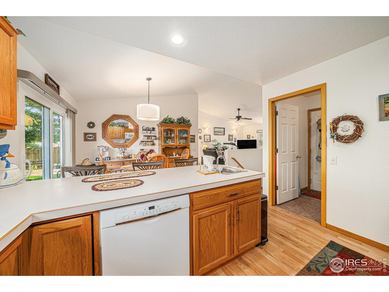 3182 50th Avenue Greeley, CO 80634 - Photo 9 of 21 a kitchen with sink cabinets and window