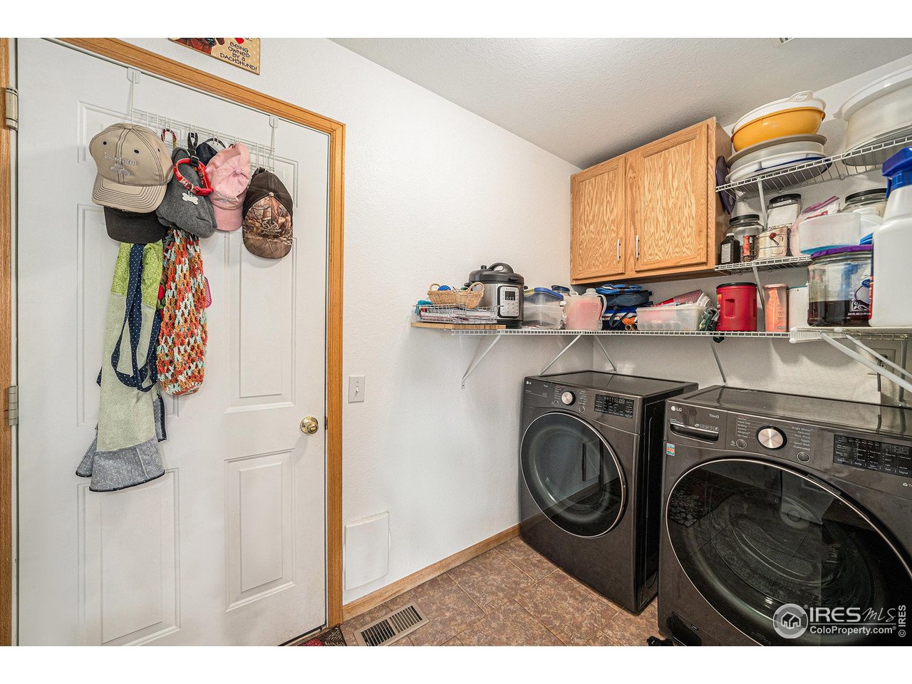 3182 50th Avenue Greeley, CO 80634 - Photo 10 of 21 a utility room with dryer and washer