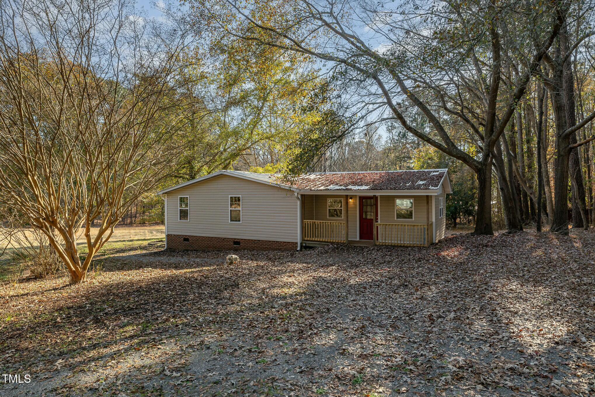 3975 Buckhorn Road Sanford, NC 27330 - Photo 1 of 24 parking /side porch
