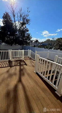 a view of balcony with furniture