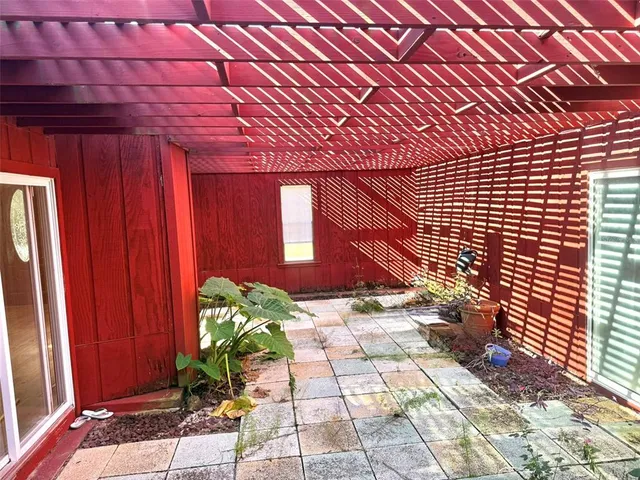 a kitchen with stainless steel appliances granite countertop a stove and a refrigerator