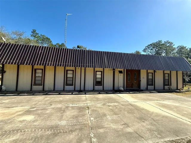 a view of a house with a garage