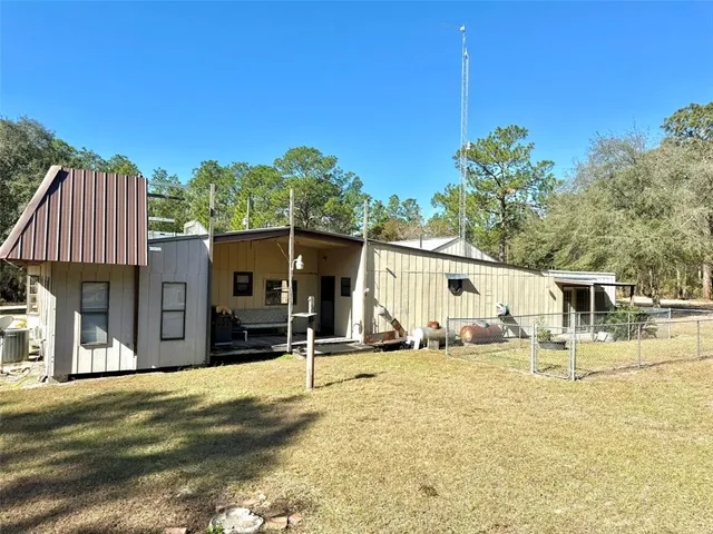 a house view with a outdoor space