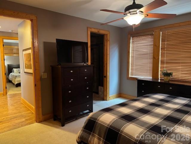 89 Springhouse Drive, Unit A4 Elk Park, NC 28622 - Photo 18 of 40 a bedroom with a bed and a tv