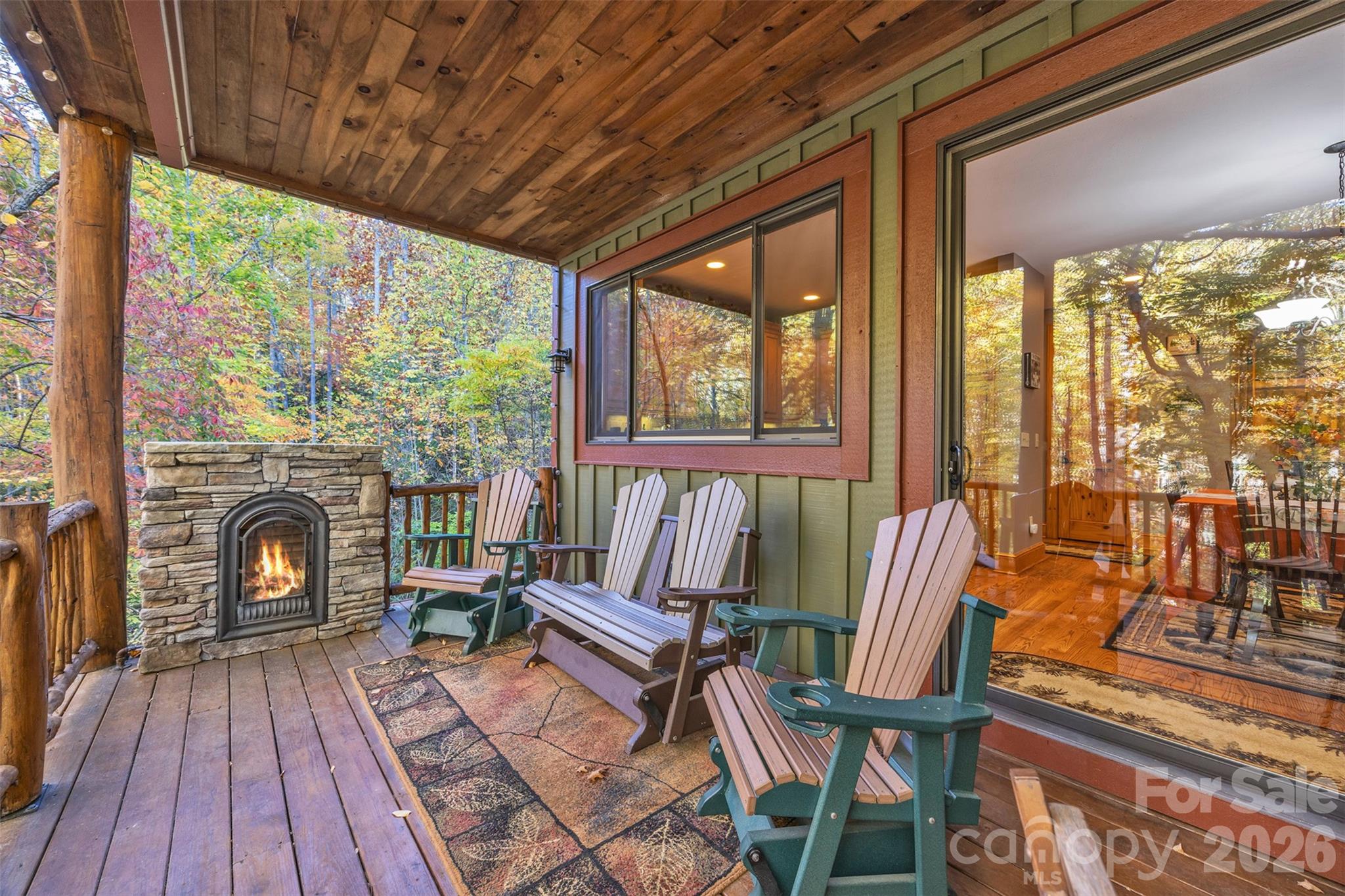 89 Springhouse Drive, Unit A4 Elk Park, NC 28622 - Photo 22 of 40 a living room with furniture and a fireplace