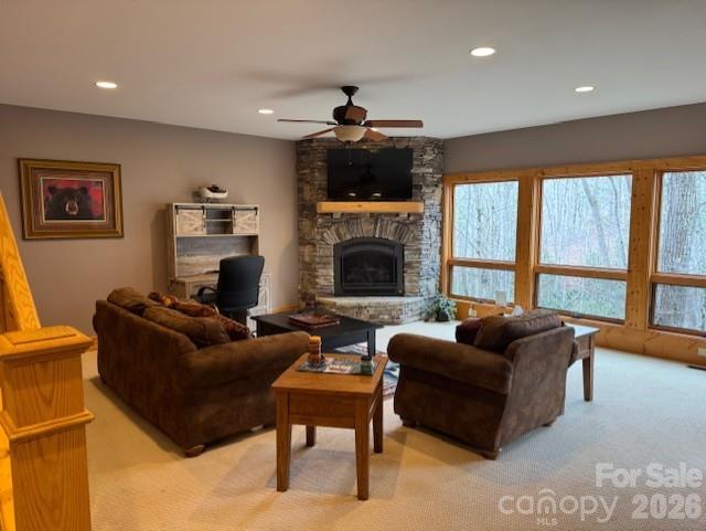 89 Springhouse Drive, Unit A4 Elk Park, NC 28622 - Photo 24 of 40 a living room with furniture a large window and a fireplace