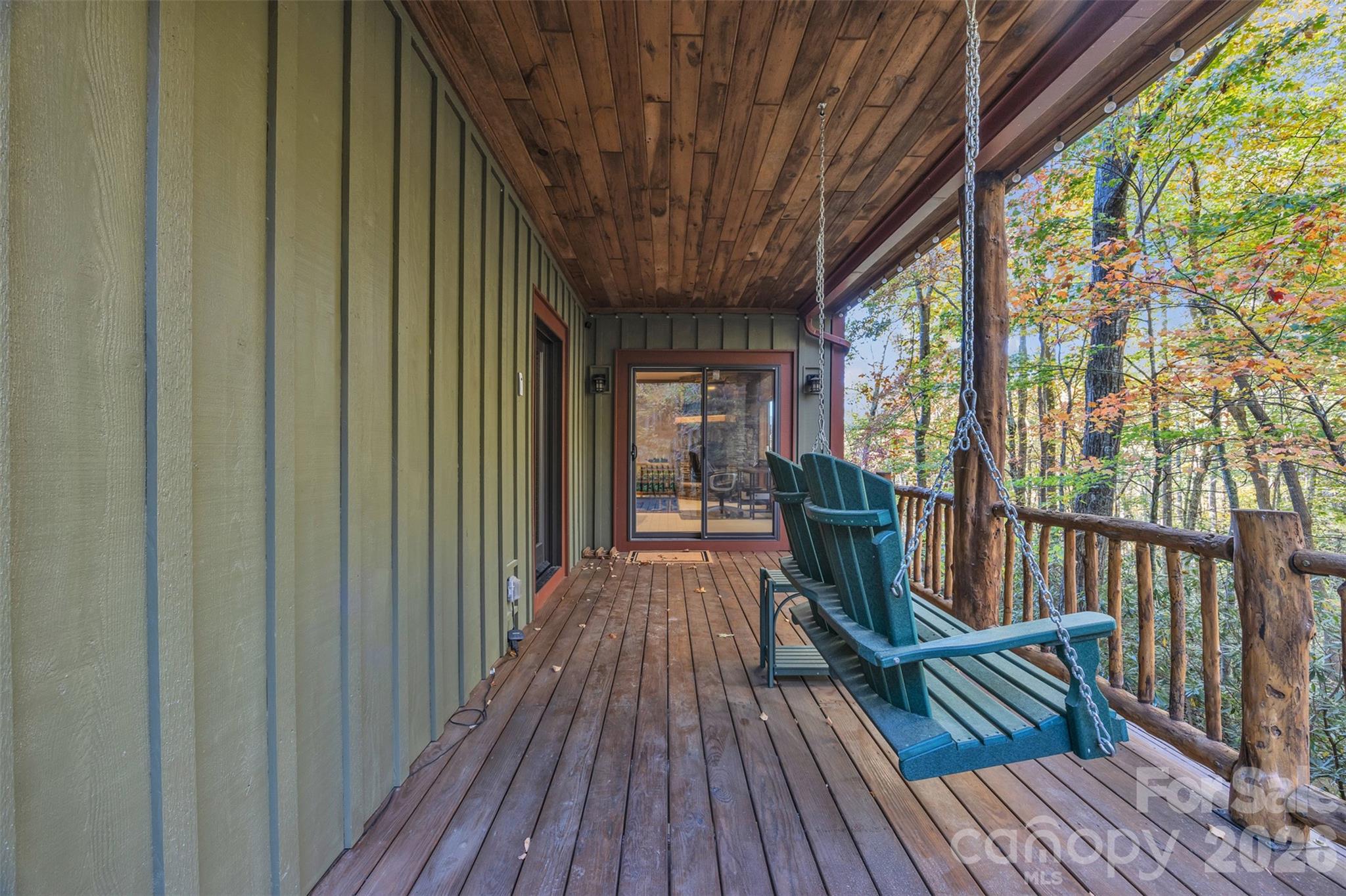 89 Springhouse Drive, Unit A4 Elk Park, NC 28622 - Photo 28 of 40 a view of outdoor space with deck and furniture