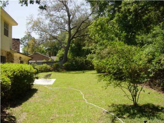 1054 Stillbrook Road Pensacola, FL 32514 - Photo 11 of 24 ANOTHER BACKYARD VIEW TO THE WEST MAKE THIS YOUR NEXT HOME