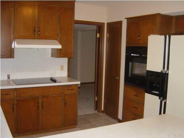 1054 Stillbrook Road Pensacola, FL 32514 - Photo 16 of 24 new tile in kitchen