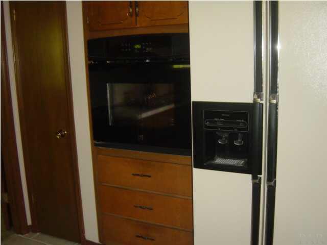 1054 Stillbrook Road Pensacola, FL 32514 - Photo 4 of 24 PANTRY CLOSET, NEW BUILTIN OVEN, DOUBLE DOOR REFRIGERATOR