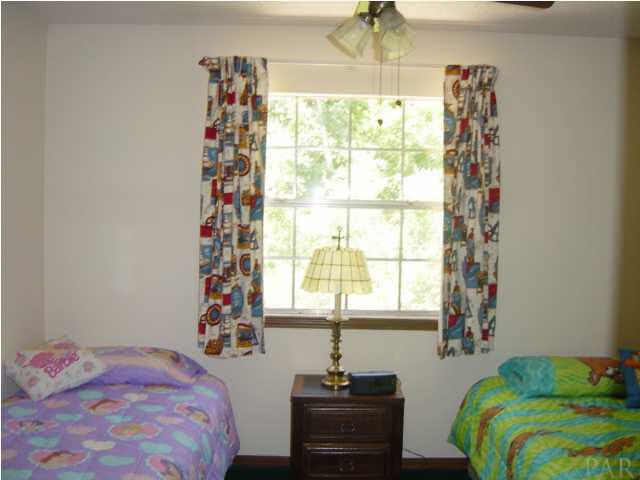 1054 Stillbrook Road Pensacola, FL 32514 - Photo 5 of 24 FIRST BEDROOM JUST OFF THE UPSTAIRS LANDING