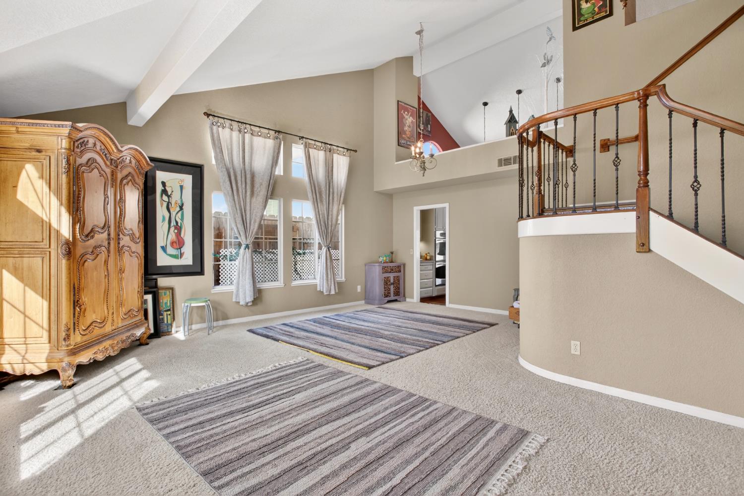 1224 Glenbrook Way Modesto, CA 95355 - Photo 11 of 49 a spacious bedroom with a large bed and a window