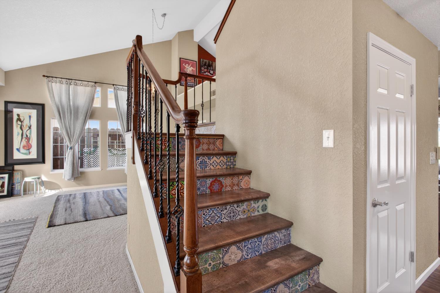 1224 Glenbrook Way Modesto, CA 95355 - Photo 13 of 49 a view of entryway and hall with wooden floor