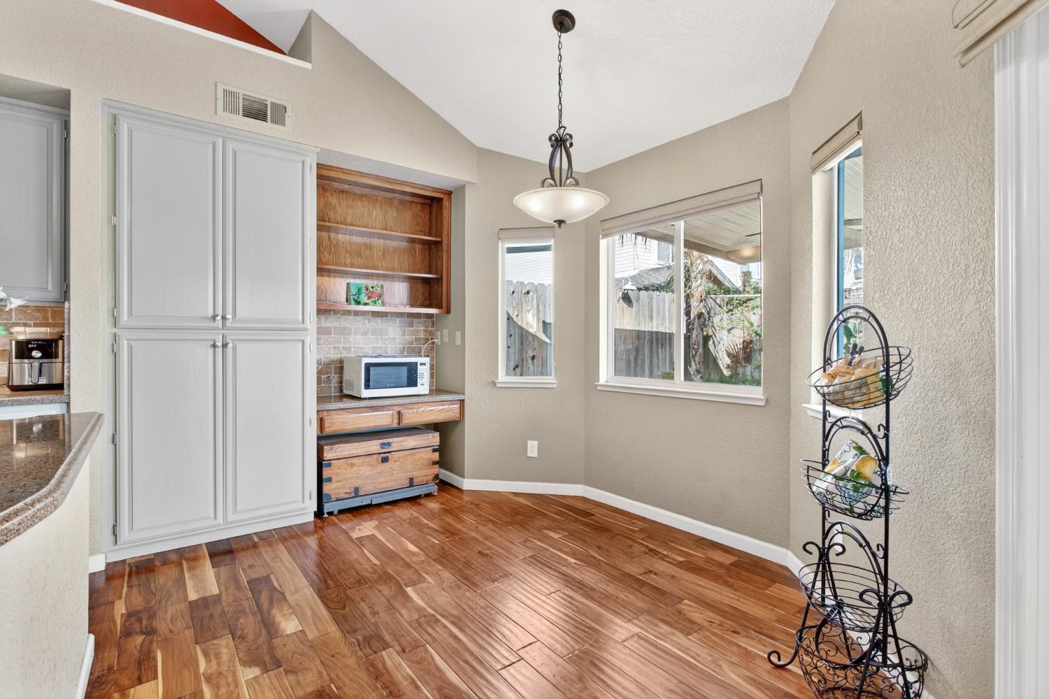 1224 Glenbrook Way Modesto, CA 95355 - Photo 22 of 49 a view of an empty room with a window
