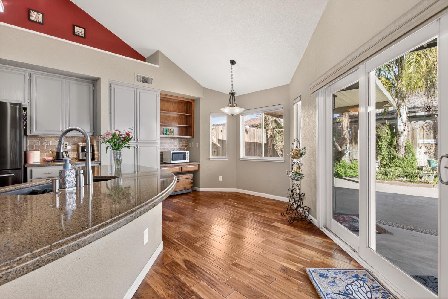 1224 Glenbrook Way Modesto, CA 95355 - Photo 24 of 49 a view of a living room and hardwood floor