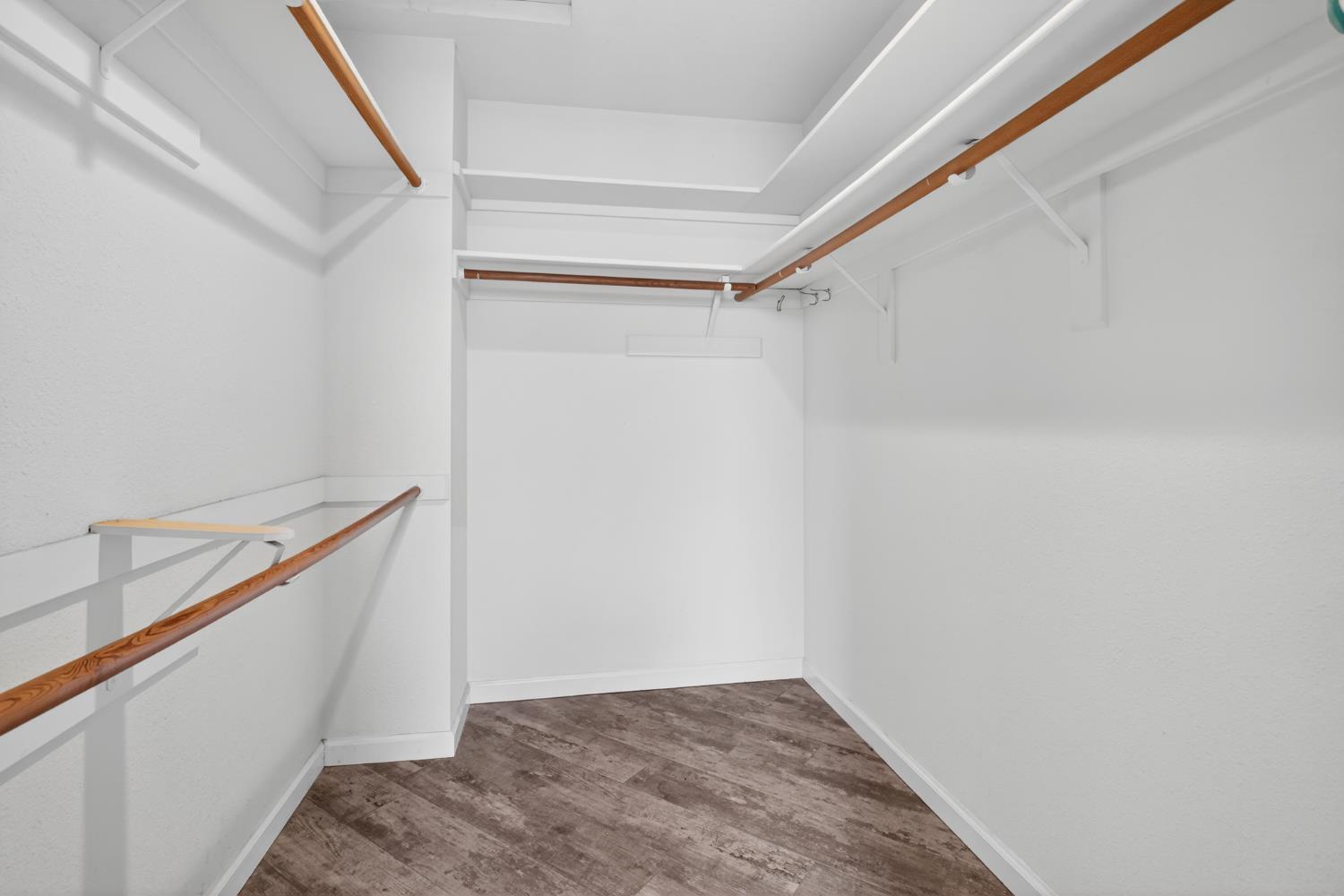 1224 Glenbrook Way Modesto, CA 95355 - Photo 28 of 49 a view of an empty walk in closet