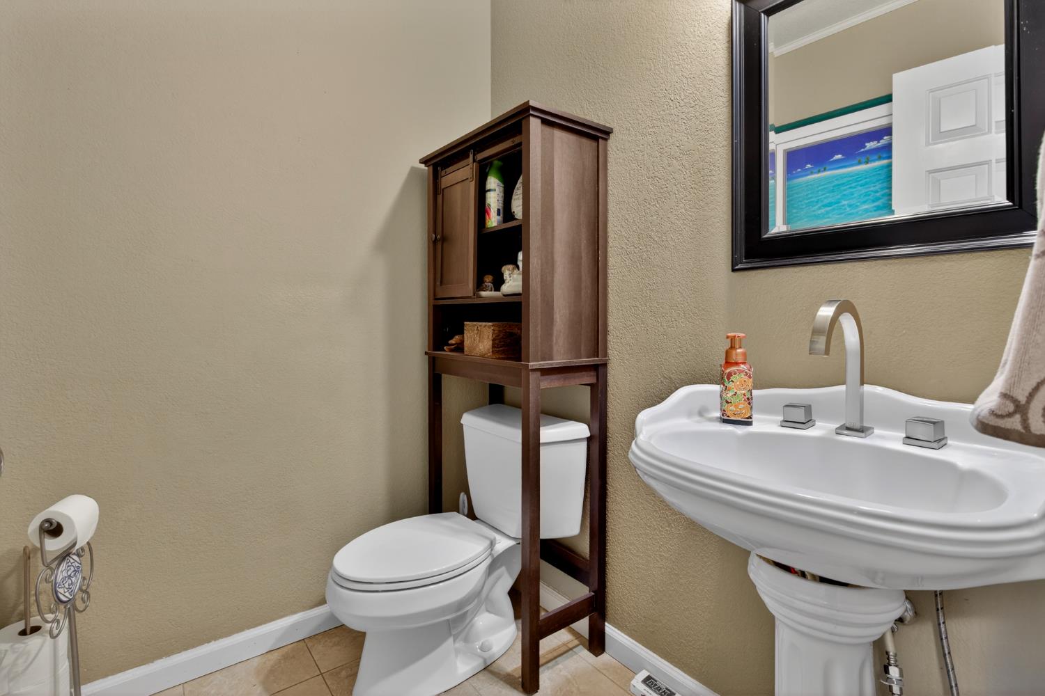 1224 Glenbrook Way Modesto, CA 95355 - Photo 30 of 49 a bathroom with a sink toilet and mirror