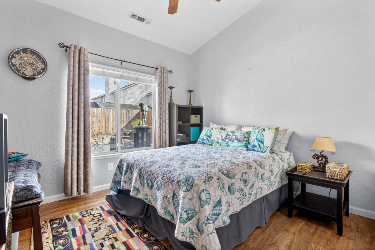 1224 Glenbrook Way Modesto, CA 95355 - Photo 32 of 49 a bedroom with a bed and a window