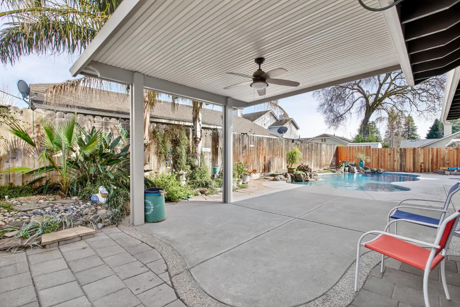 1224 Glenbrook Way Modesto, CA 95355 - Photo 44 of 49 a view of a chairs and table in the patio