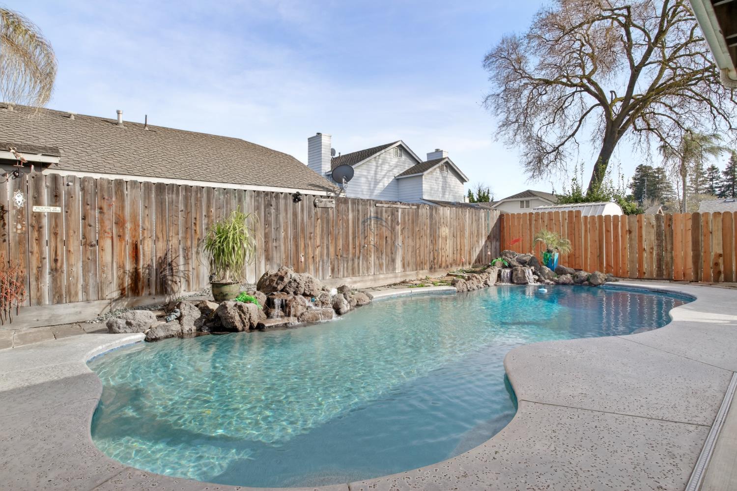 1224 Glenbrook Way Modesto, CA 95355 - Photo 48 of 49 swimming pool view with a outdoor seating