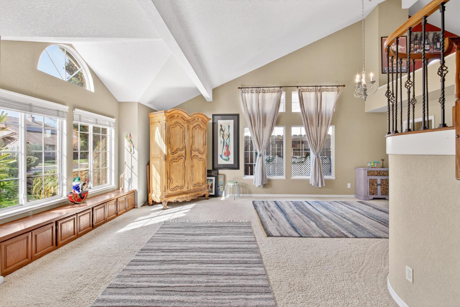 1224 Glenbrook Way Modesto, CA 95355 - Photo 10 of 49 a spacious bedroom with a large bed and a large window