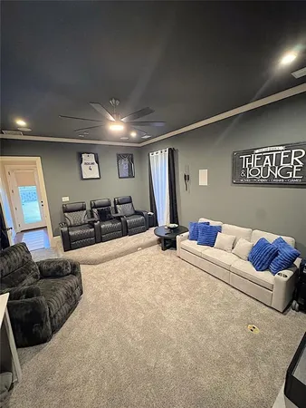 a living room with furniture window and couch