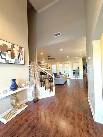 a view of a living room and dining room