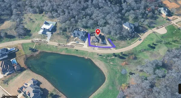 a view of a wooden floor with a swimming pool