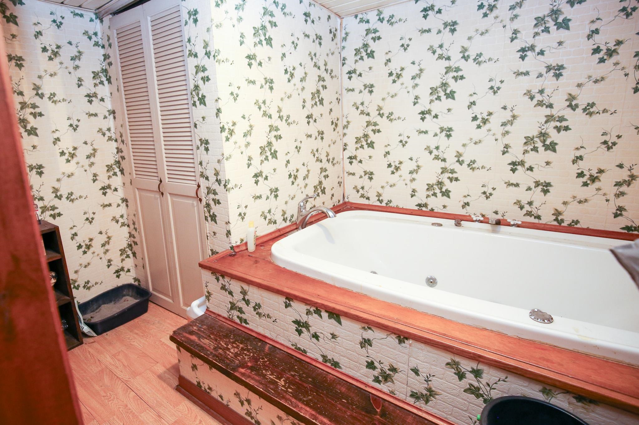 2144 Swarts Road Dixon, IL 61021 - Photo 11 of 31 a bathroom with a bathtub and shower