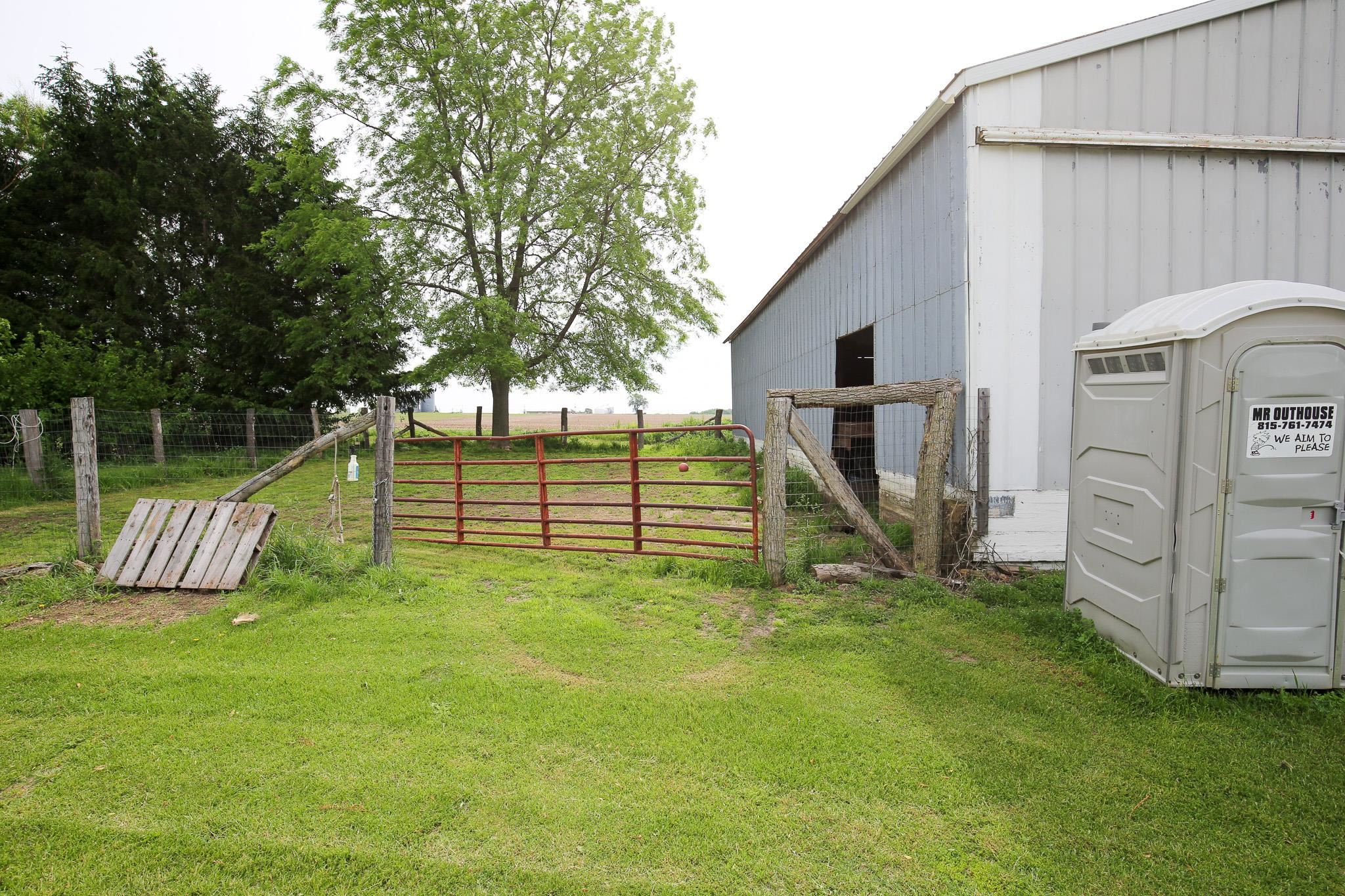 2144 Swarts Road Dixon, IL 61021 - Photo 19 of 31 a view of a backyard with white house