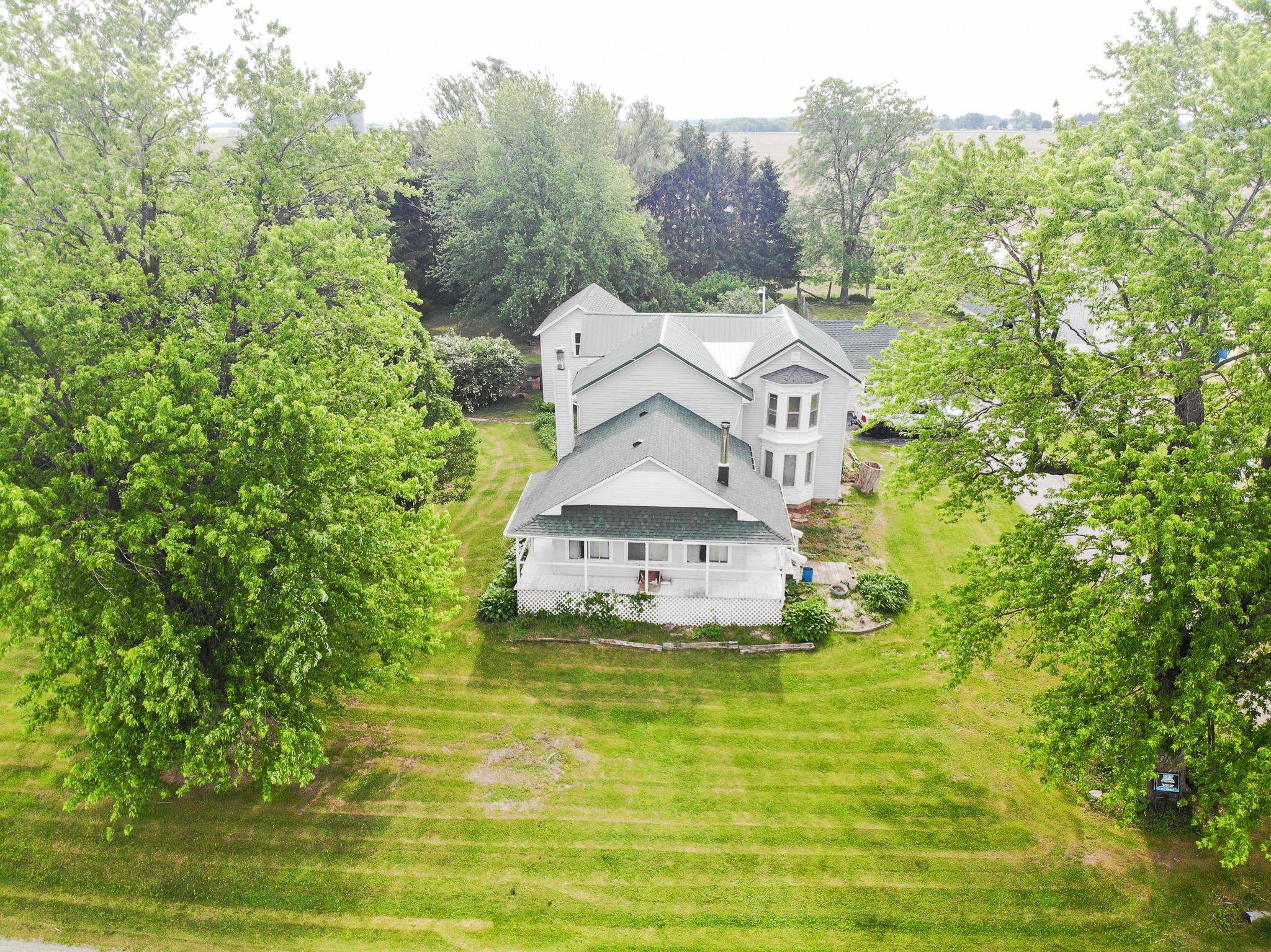 2144 Swarts Road Dixon, IL 61021 - Photo 23 of 31 a aerial view of a house with a yard and swimming pool