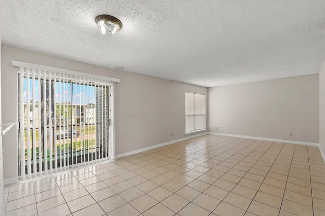 a view of an empty room with window
