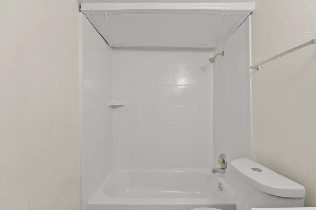 a bathroom with a bathtub