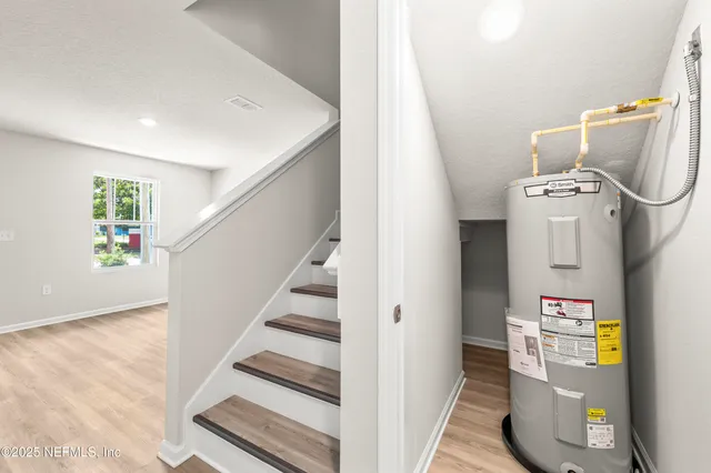 a view of entryway with workspace and stairs