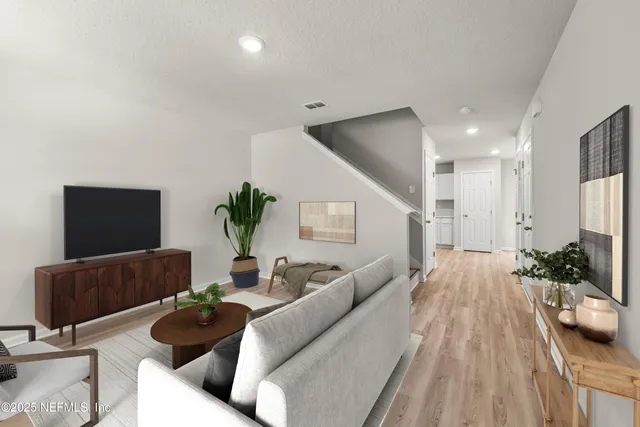 a living room with furniture and a couch