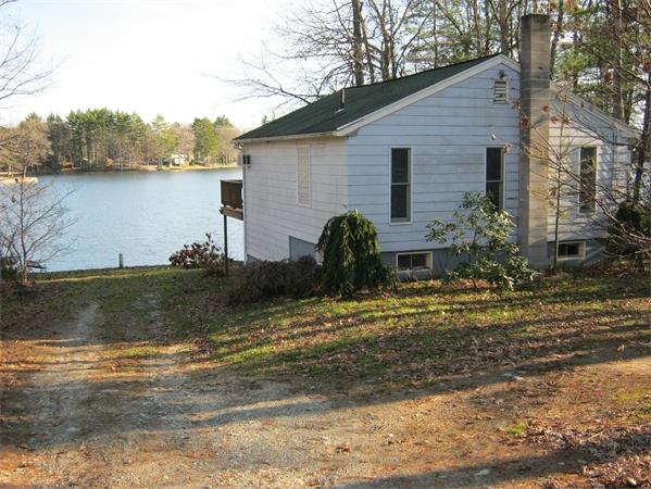 35 Cottage Road Dudley, MA 01571 - Photo 3 of 12 a view of a house with a yard