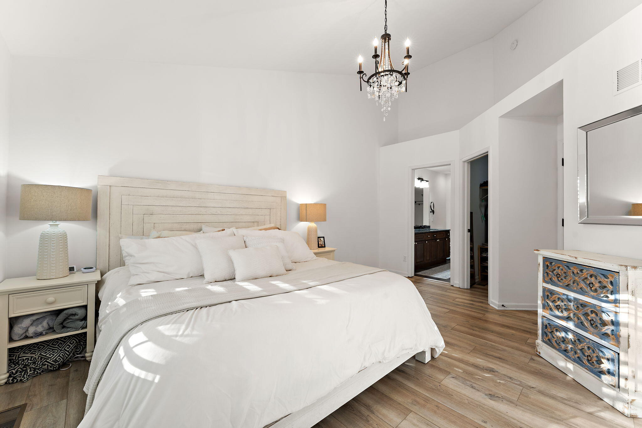 2335 Legend Circle Chesterton, IN 46304 - Photo 14 of 33 a bedroom with a bed and a chandelier