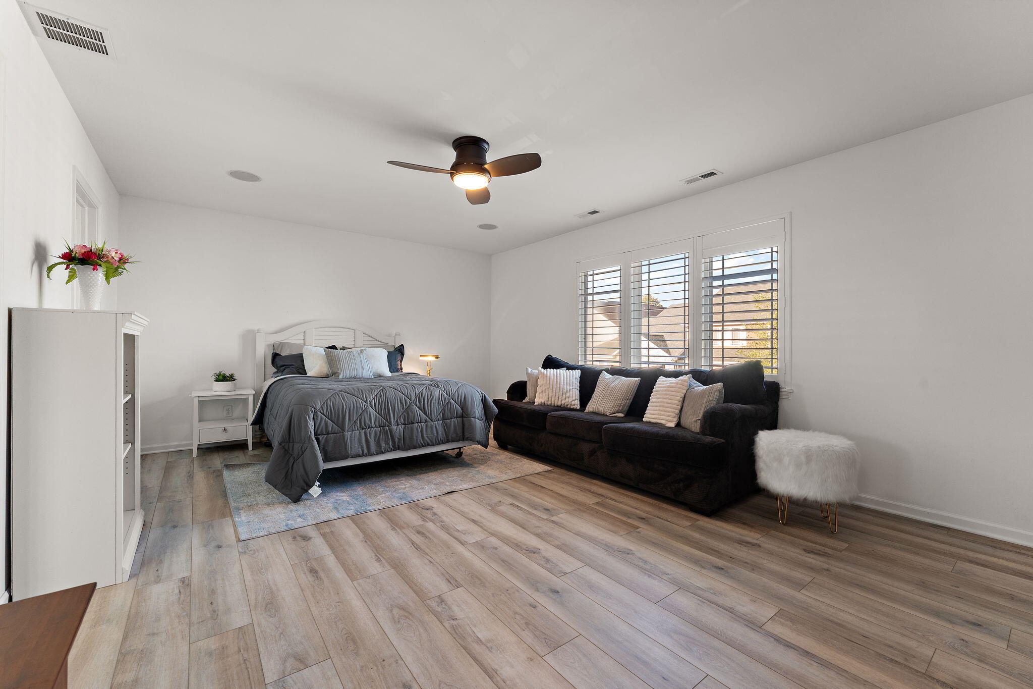 2335 Legend Circle Chesterton, IN 46304 - Photo 22 of 33 a bedroom with a bed and wooden floor