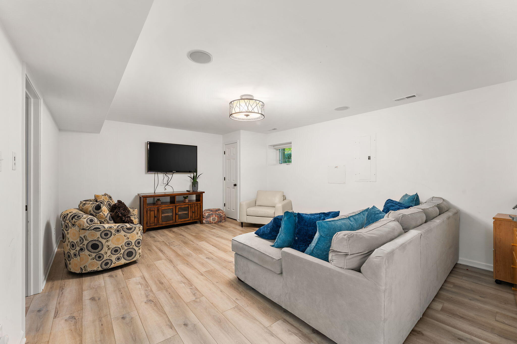 2335 Legend Circle Chesterton, IN 46304 - Photo 24 of 33 a living room with furniture and a flat screen tv