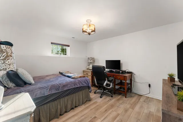 a bathroom with a tub and shower